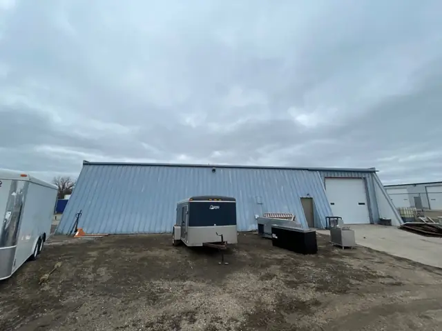 A shop building with a paved apron, a commercial building inspected by Nordic Inspections in Moorhead, MN.