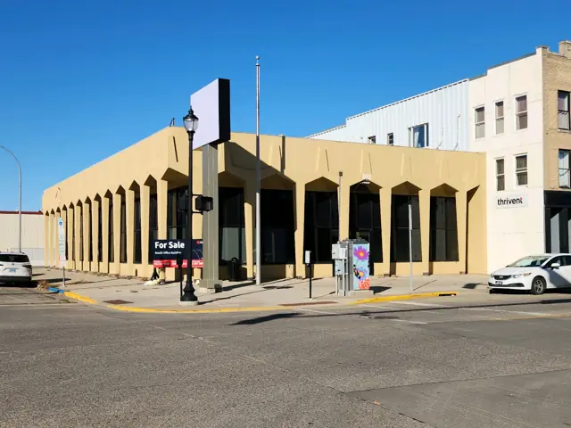 A single-story office building with a front parking lot — commercial building inspected by Nordic Inspections in Valley City, ND.