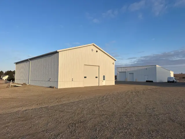 A shop building with a paved apron, a commercial building inspected by Nordic Inspections in Valley City, ND.
