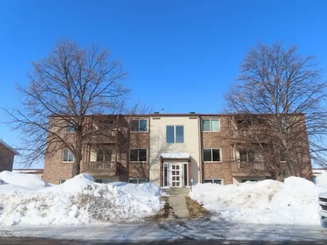 A walk-up apartment building with a shared entrance, a commercial building inspected by Nordic Inspections in Wahpeton, ND.