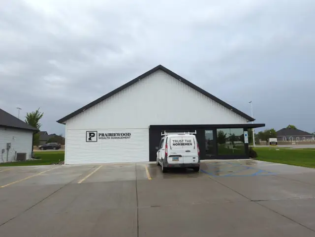 An office building with a landscaped entrance — commercial building inspected by Nordic Inspections in West Fargo, ND.