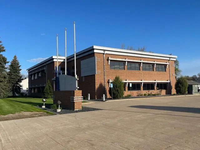 A single-story office building with a front parking lot — commercial building inspected by Nordic Inspections in West Fargo, ND.