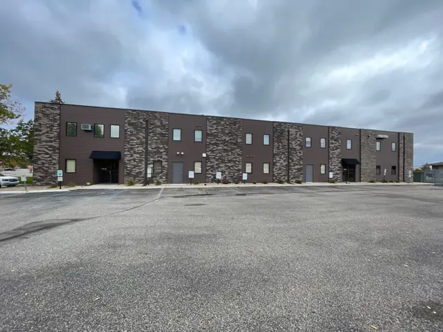 An office/warehouse with a paved lot, a commercial building inspected by Nordic Inspections in West Fargo, ND.