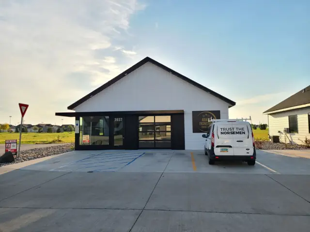 A retail storefront building — commercial building inspected by Nordic Inspections in West Fargo, ND.