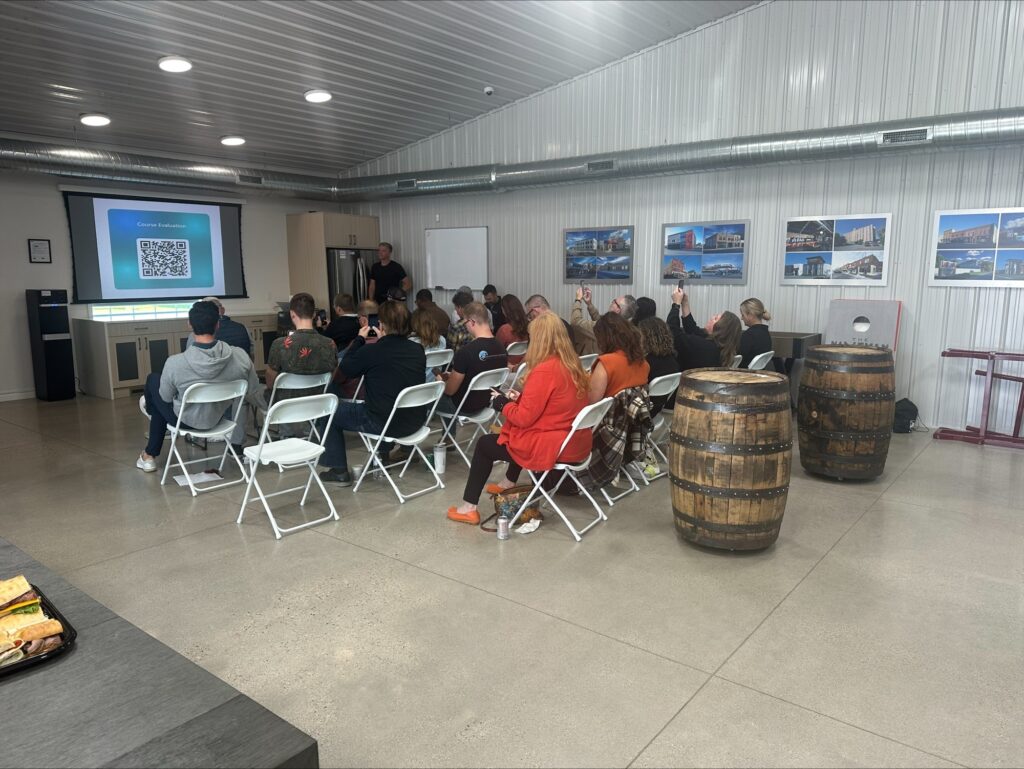 Agents completing the course evaluation at a Nordic Inspections Realtor CE class